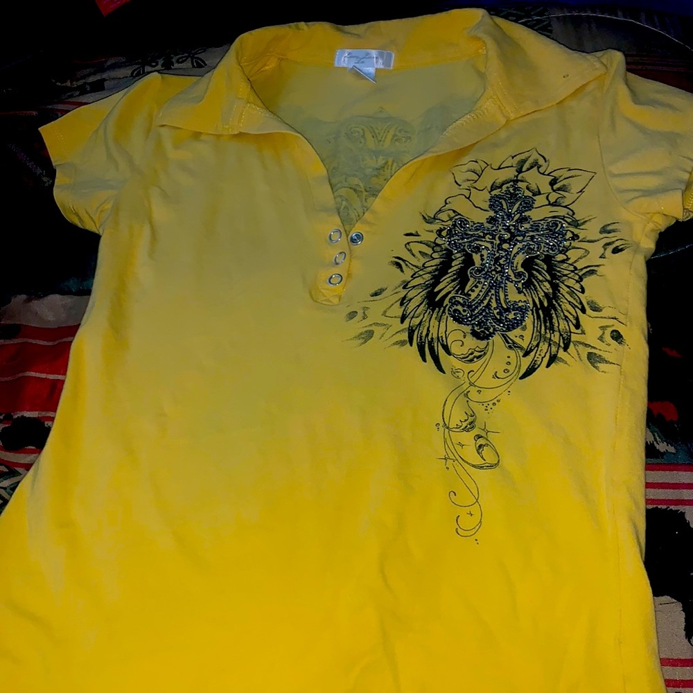 Yellow top with cross angels on the back